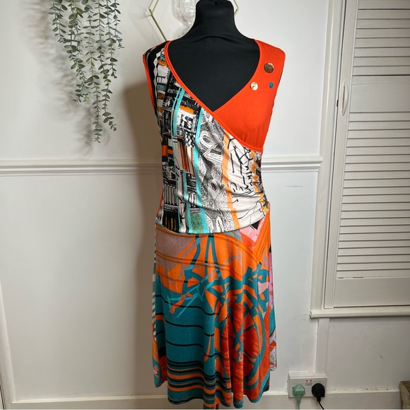 Save The Queen Dresses & Skirts - Save the Queen abstract print asymmetric hem midi wrap dress